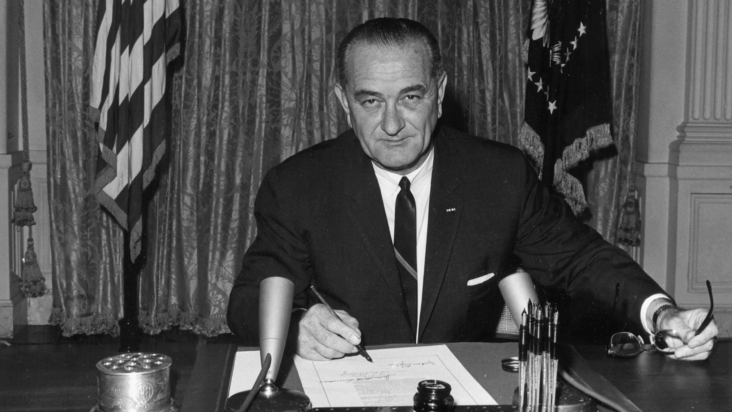 President Lyndon B. Johnson signs Gulf of Tonkin resolution