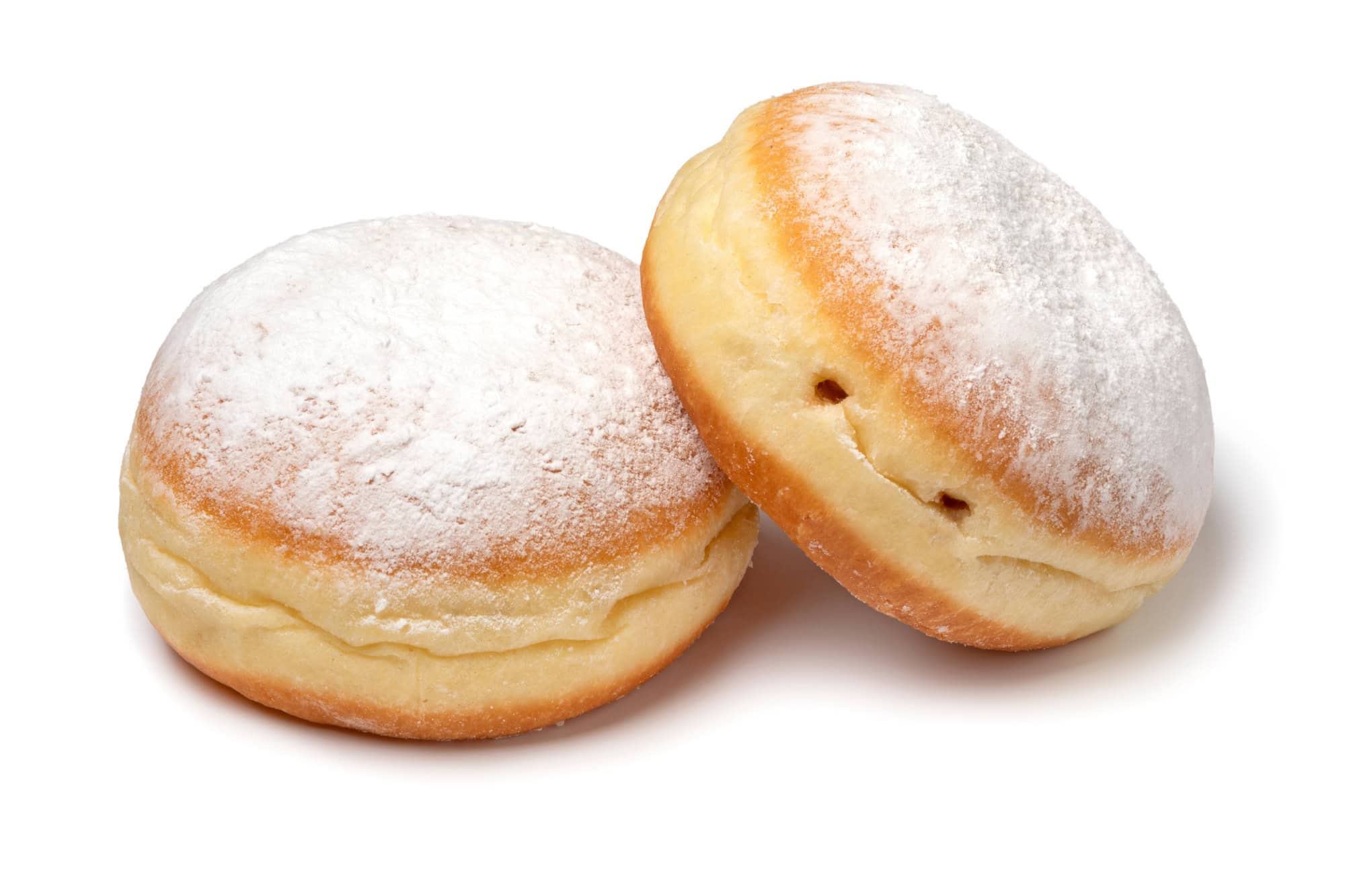 Pair of fresh baked Berliner donuts covered with white sugar close up isolated on white background