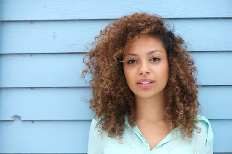 Horizontal portrait of a beautiful young african woman looking at camera