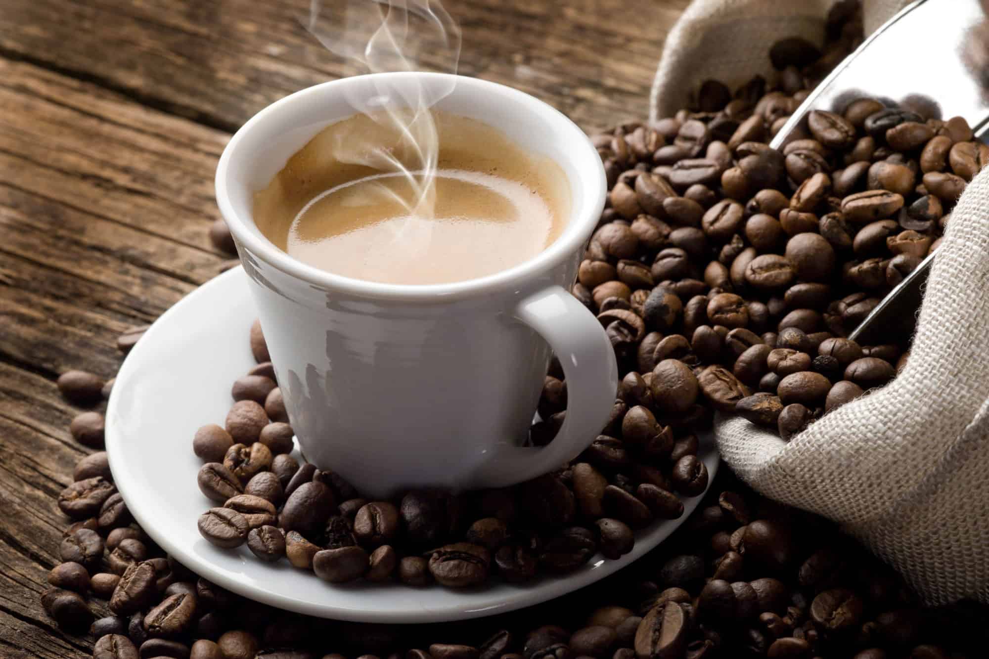 Hot coffee and coffee beans