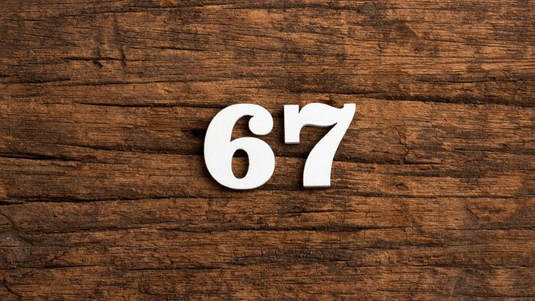 Number 67 - piece on rustic wood background