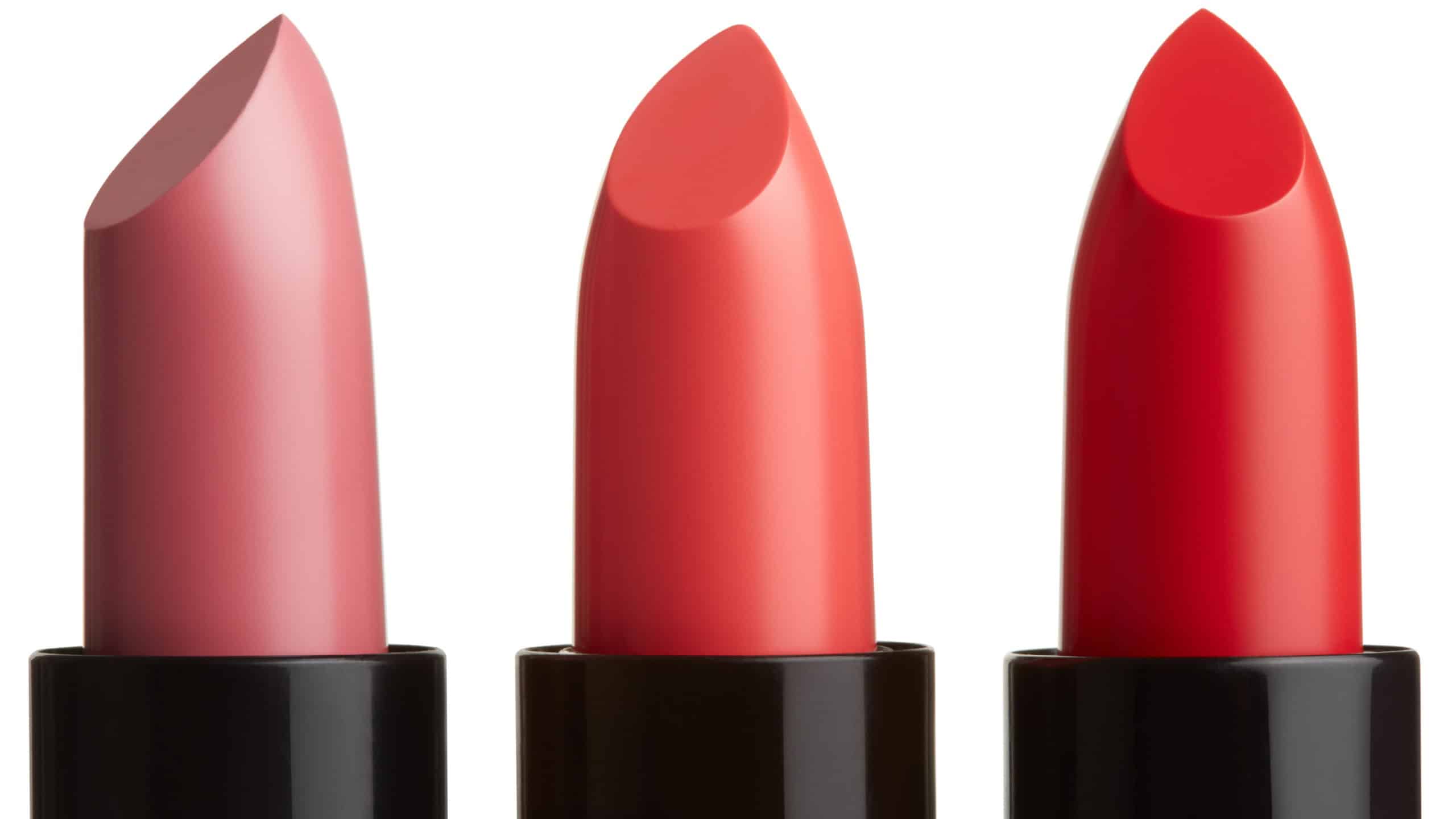 Three lipstick group in pink, red, coral color isolated on white, clipping path included