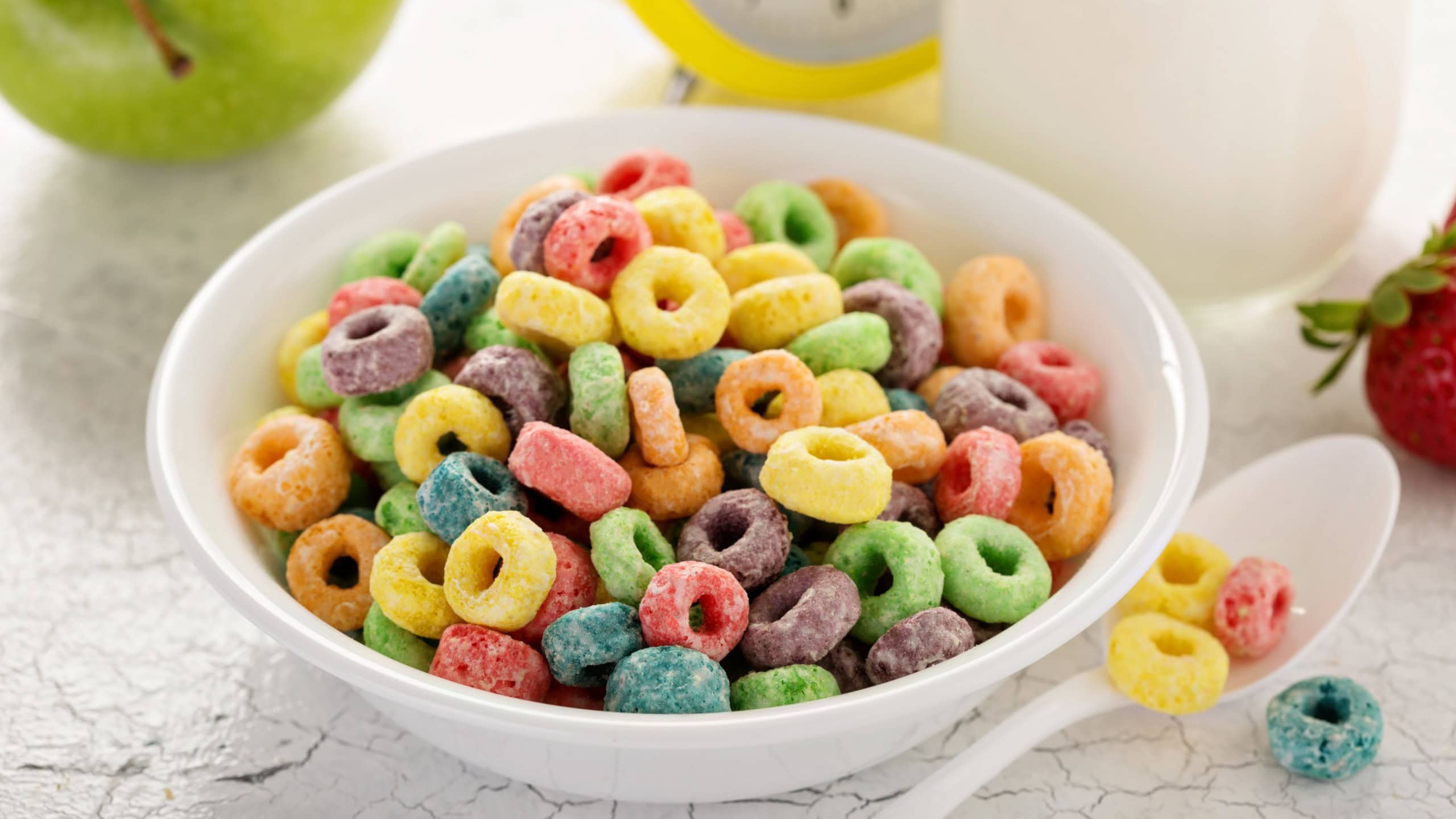 Fruit colorful sweet cereals in a bowl, traditional quick breakfast or snack for kids
