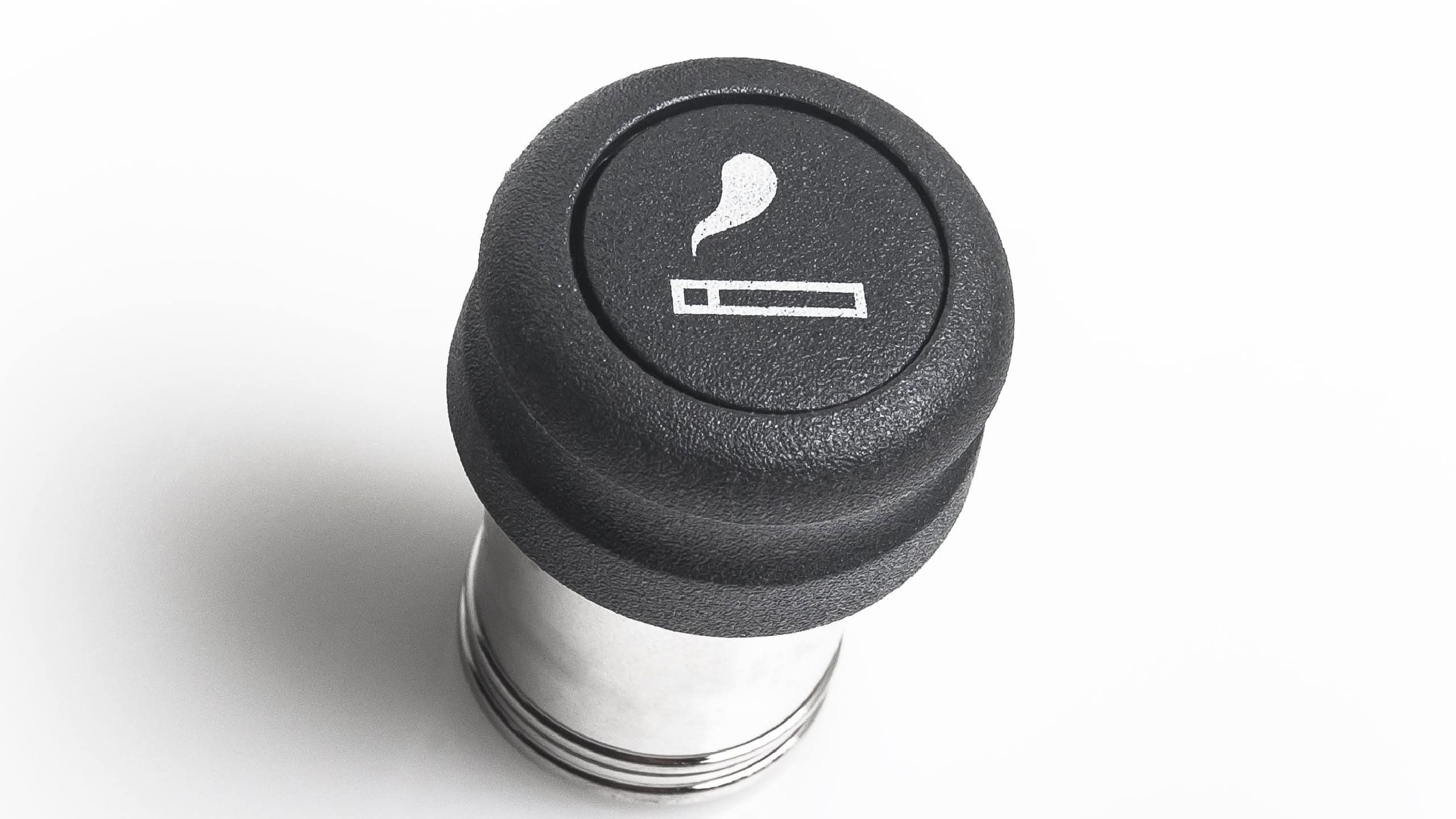 Car cigarette lighter on white background