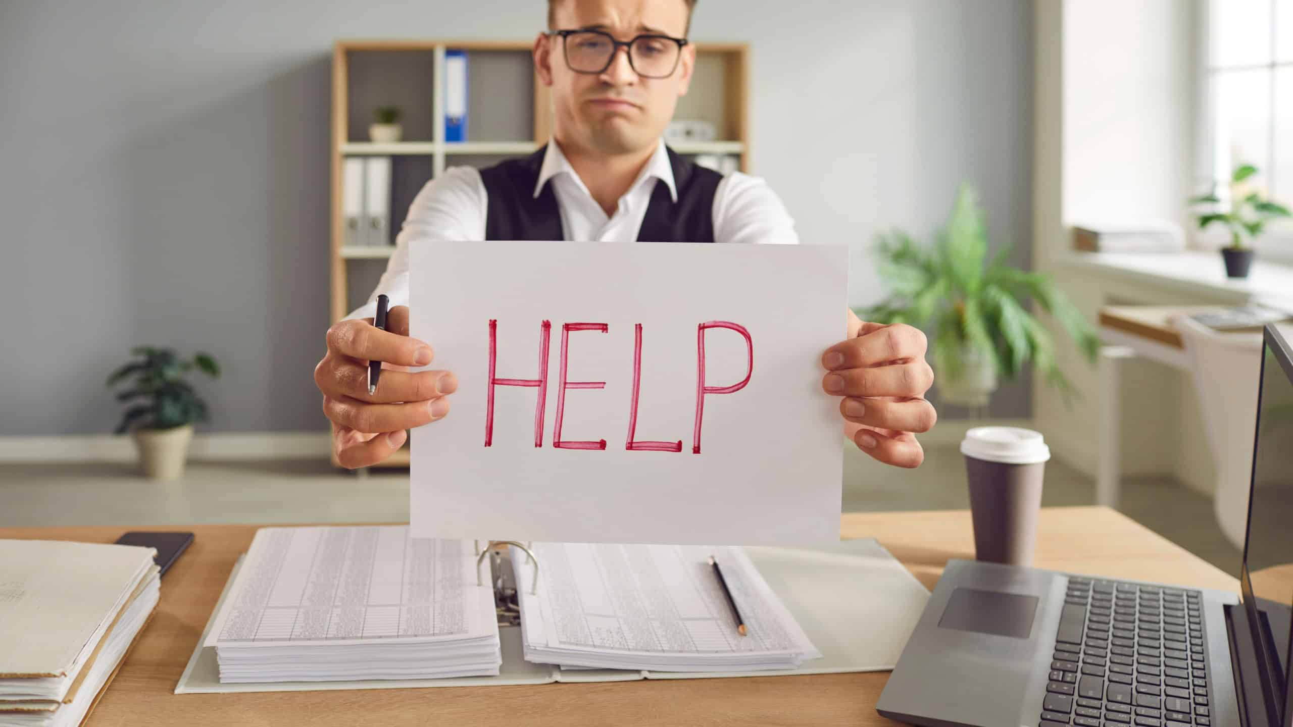 Male entrepreneur, bookkeeper or financial accountant asking to help him with business paperwork workload