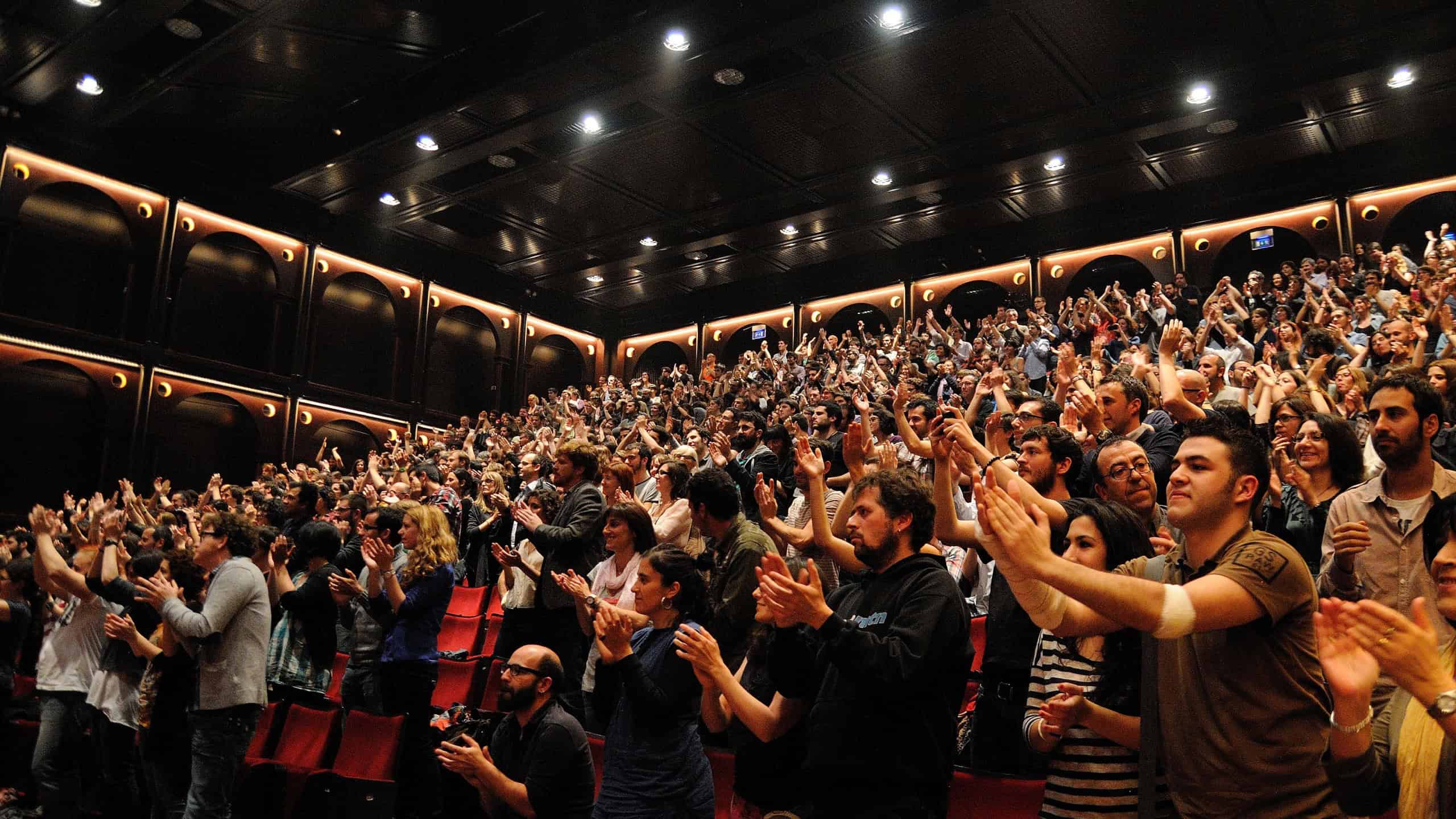 Audience applauding at show