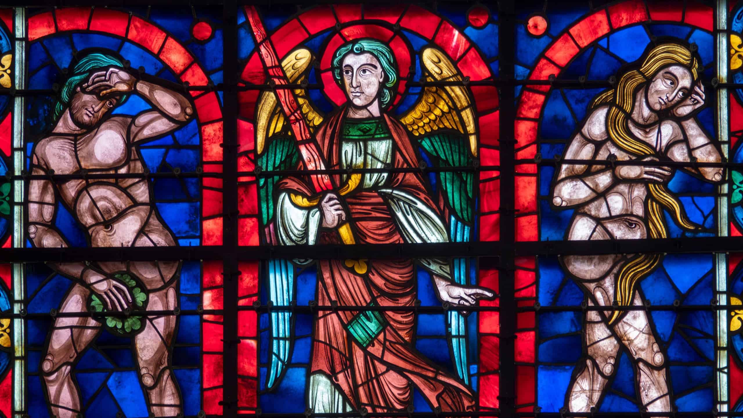 Stained glass (19th century) of Adam and Eve expelled from paradise.