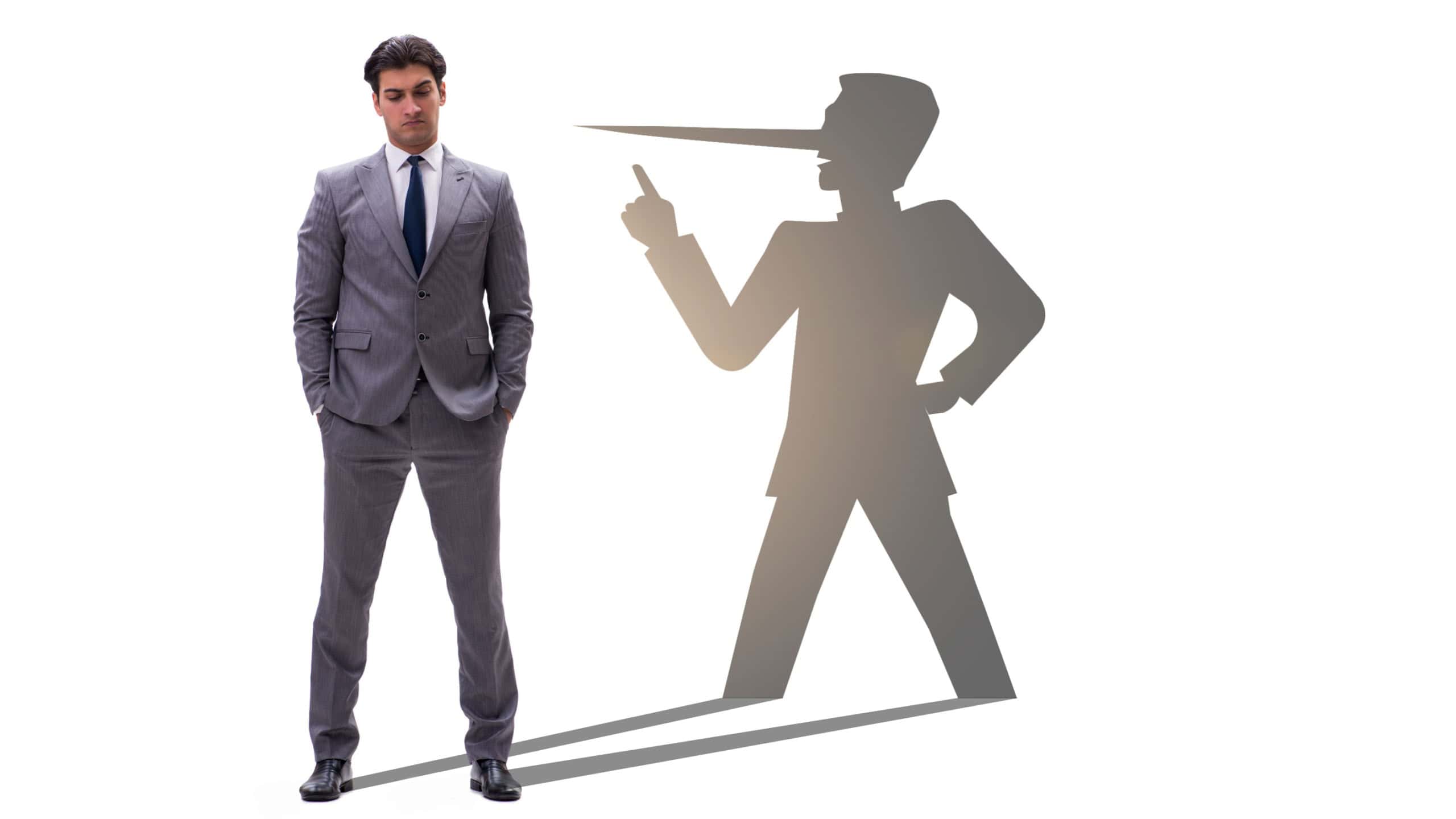 Concept of businessman liar with his shadow