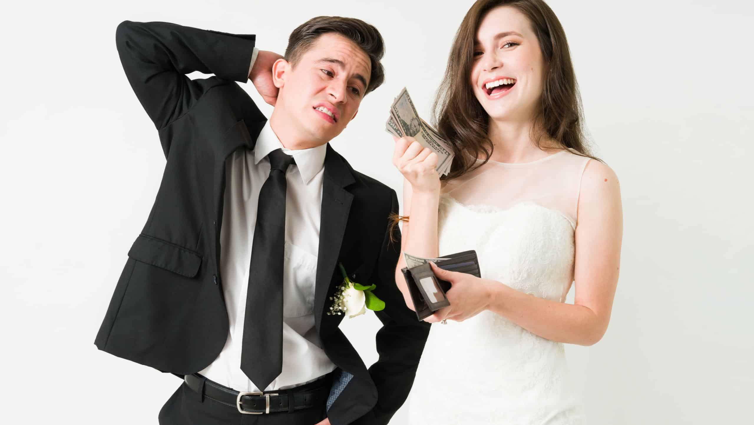 Beautiful young wife feeling excited while showing the wallet and money from the stressed upset groom