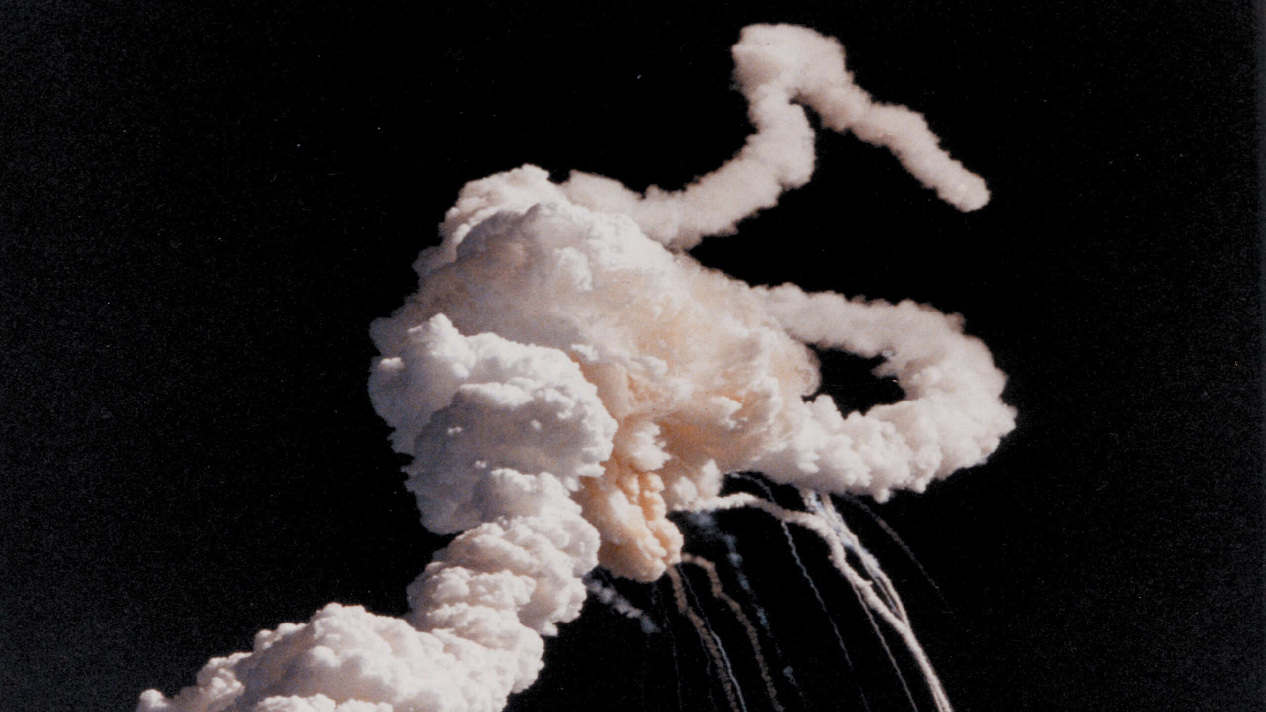 The space shuttle Challenger breaks apart 73 seconds after launch on January 28th 1986.