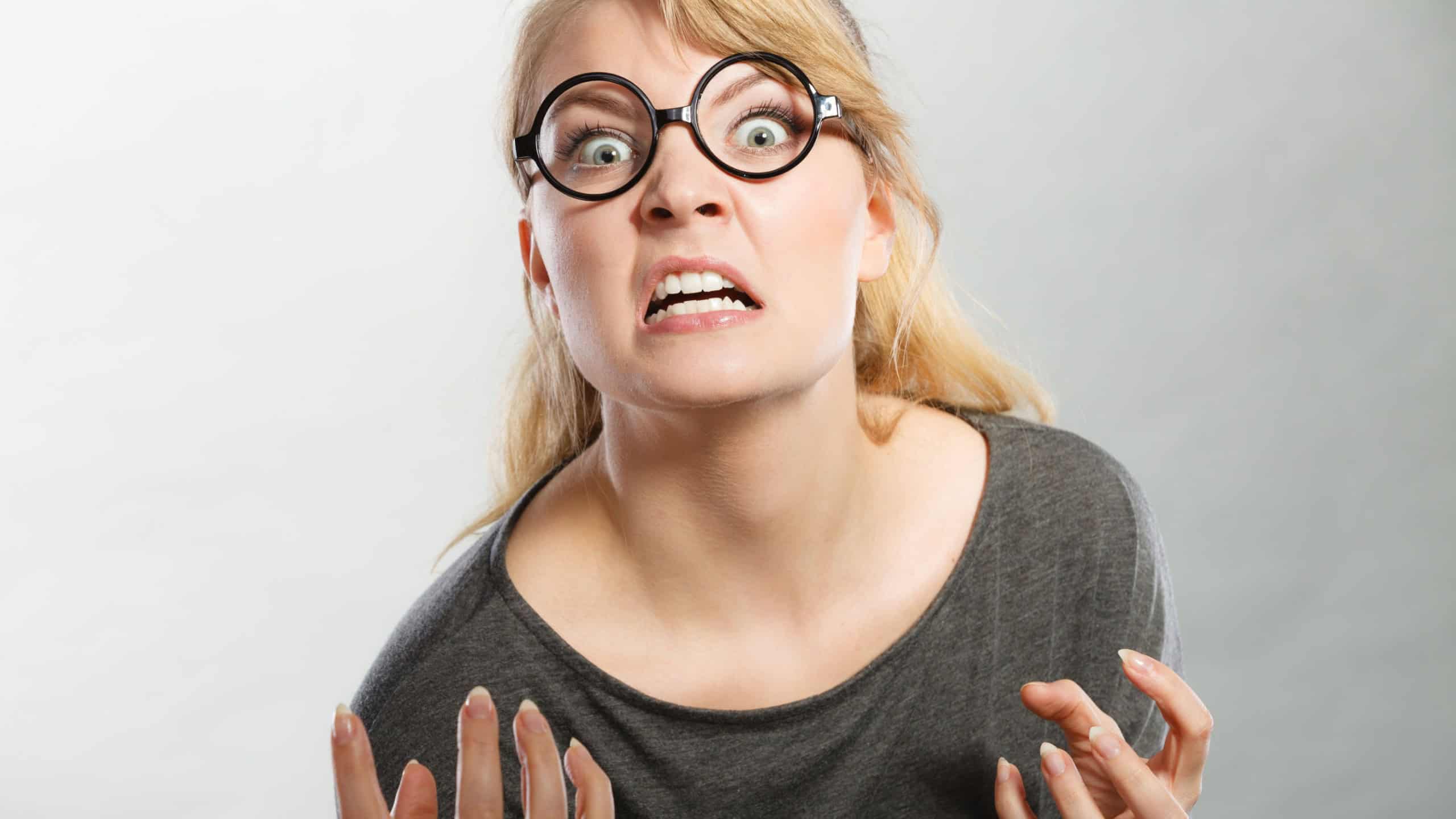 Psychology frustration emotions feelings concept. Furious woman yelling. Nedry girl angered frustrated screaming out of wrath.