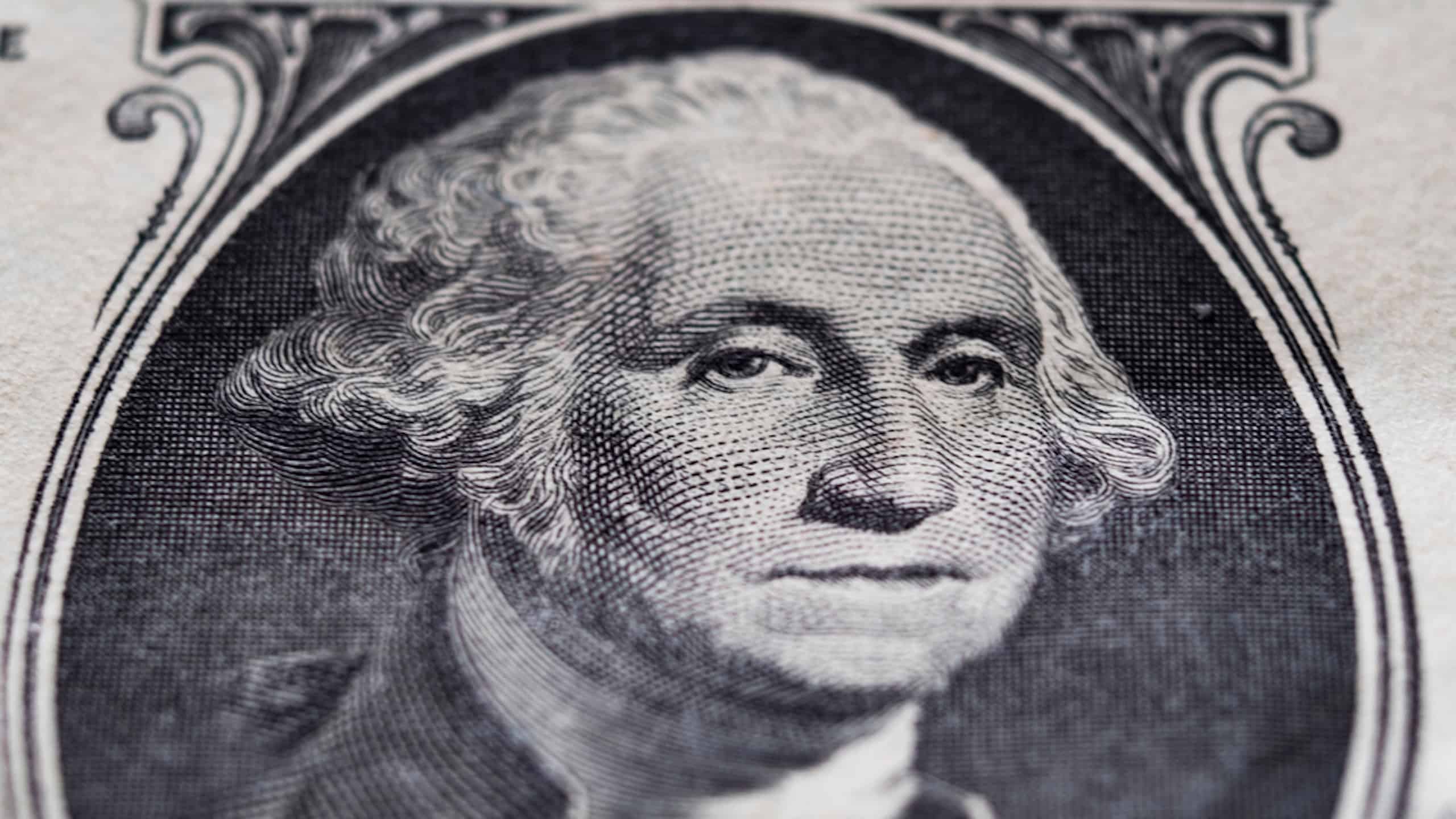 Portrait of George Washington on 1 dollar bill extreme close-up