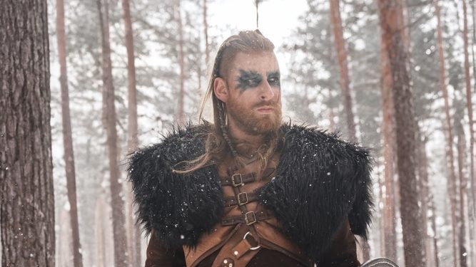 A,Fierce,Viking,Warrior,Poised,With,An,Axe,And,Shield