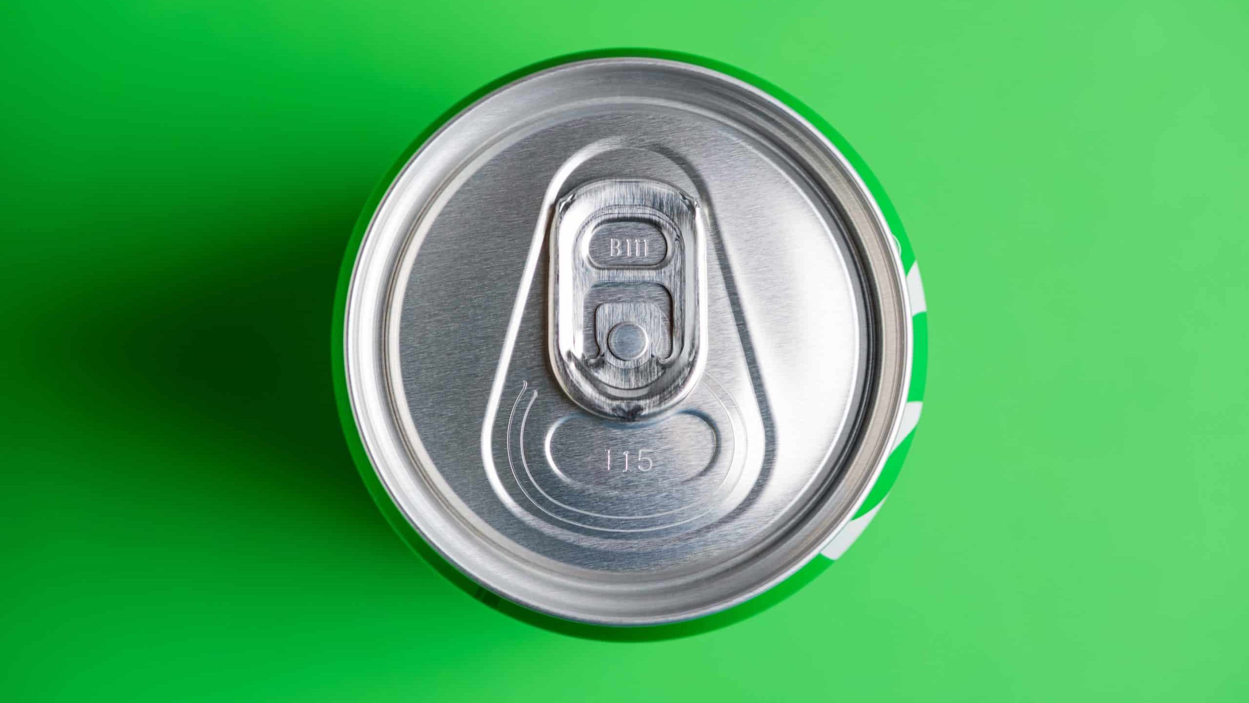 Lviv, Ukraine - May 25, 2025: Close-up cap of Sprite soda drink can on green background. Top view