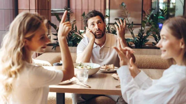 Man,At,A,Restaurant,Table,Looking,Annoyed,And,Bored,By