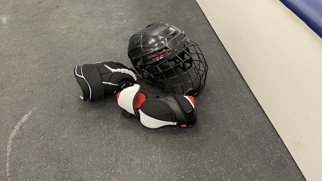 Sportswear and skates for a hockey player in the team's locker room