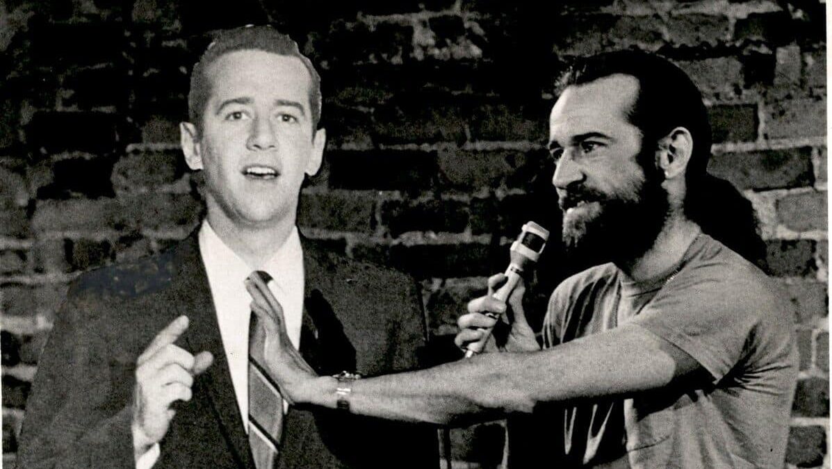 George Carlin and a cardboard cutout of himself from a few years ago