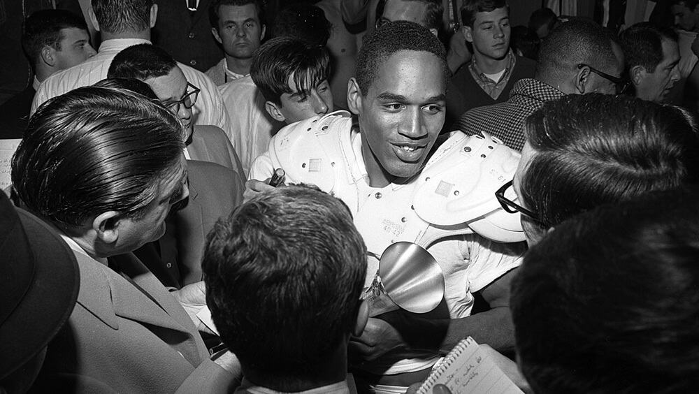 O.J. Simpson talking to reporters, 1967