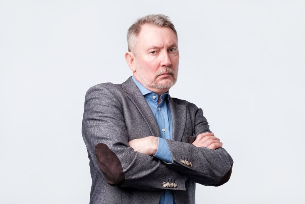 Boss does not trust his subordinate. Studio shot