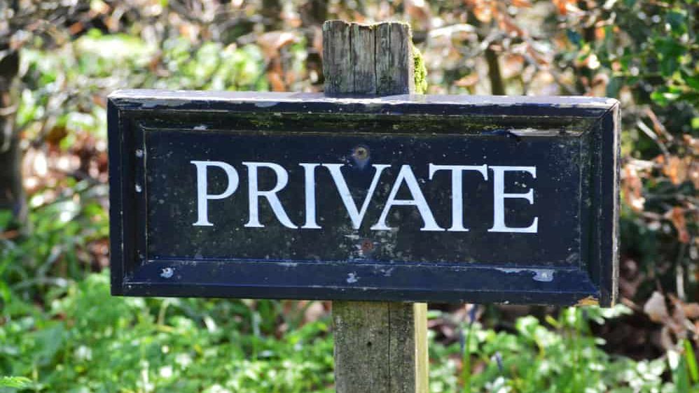 garden sign reading private