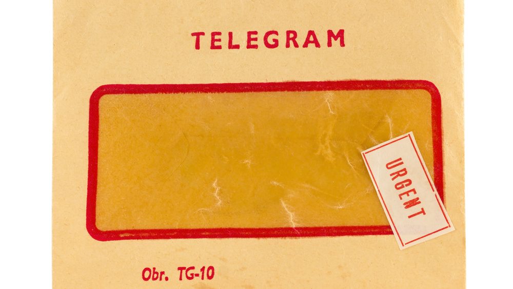 Old telegram envelope with urgent mark