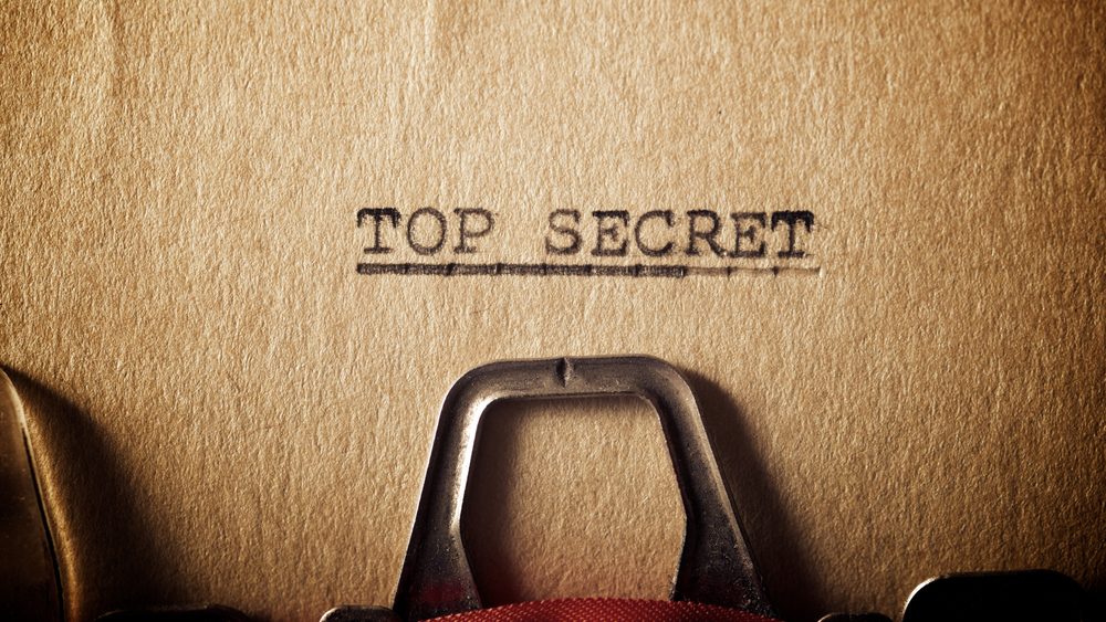 Top secret document with a padlock symbolizing confidentiality.