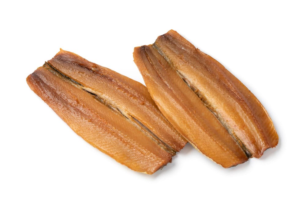 Pair of Kippers, fillet smoked herring, isolated on white background