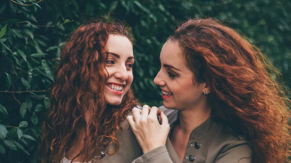 Two twins sisters spending time together