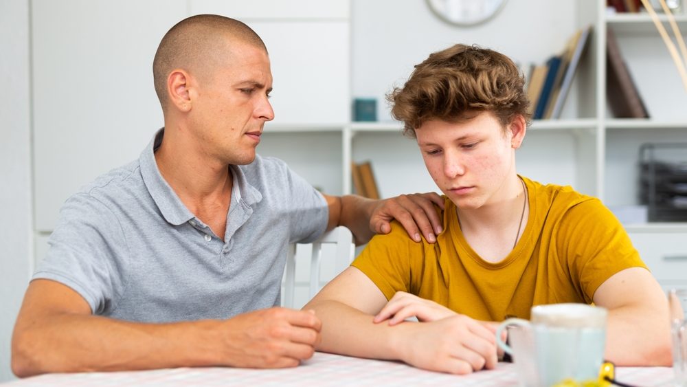 Portrait of guy with his father who are resting together at the home