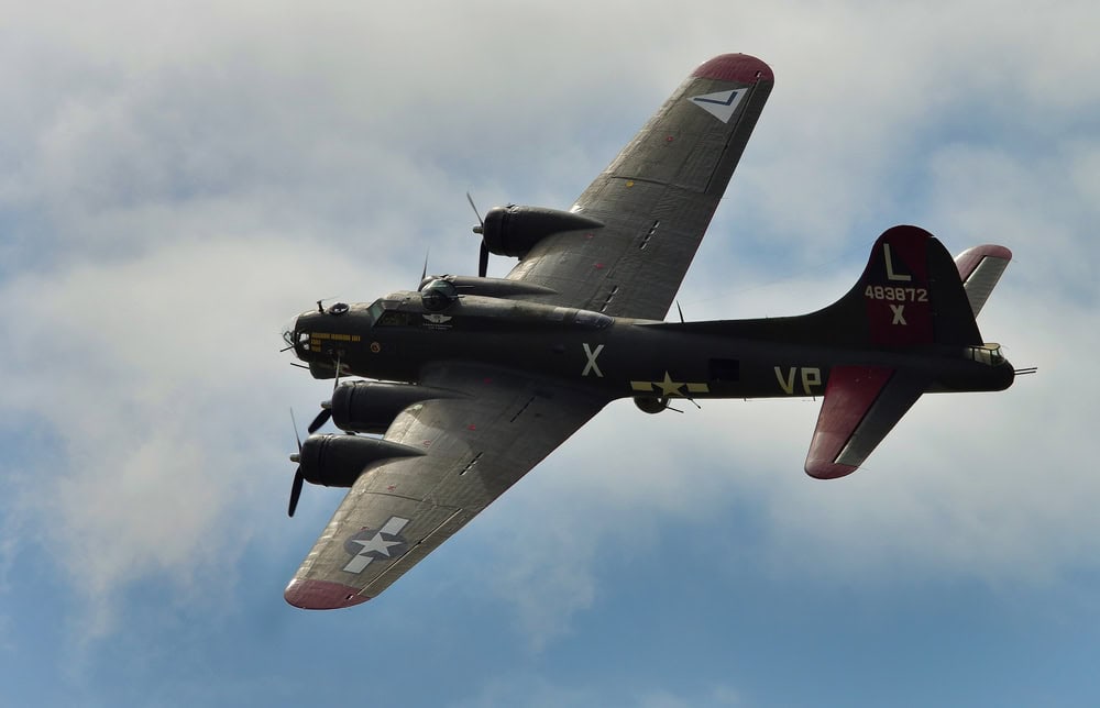 KANSAS CITY, UNITED STATES - Sep 24, 2014: A horizontal shot of a B-17 bomber airplane flying in the sky