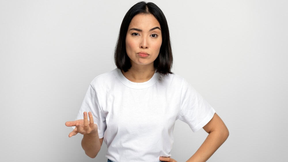 What do you want. Portrait of angry disgruntled girl asking who why make this conflict, looking with annoyed indignant expression. Studio shot isolated on white background