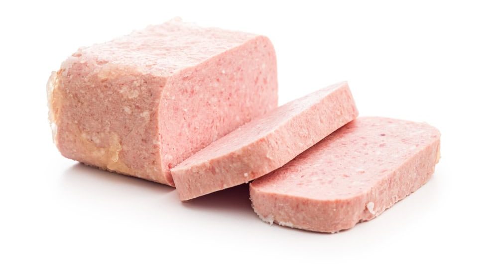 Luncheon meat isolated on the white background.