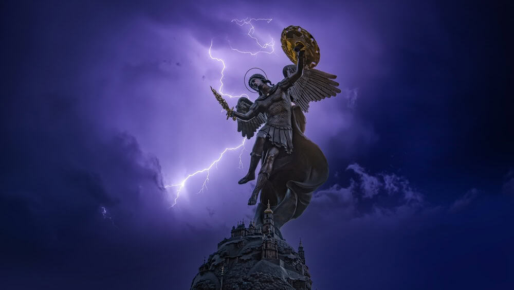 Kyiv, Ukraine - June 1, 2022: Fountain with a sculpture of Archangel Michael in the park Volodymyr Hill in Kyiv, Ukraine