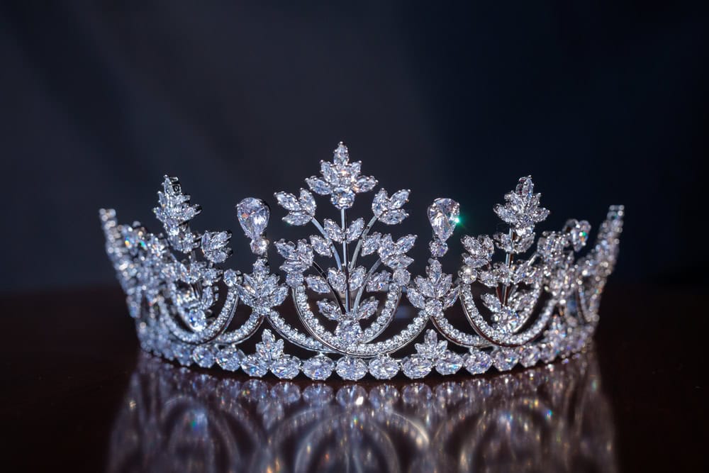 A tiara is a jeweled head ornament. Its origins date back to ancient Iran, which was then adapted by Greco-Romans. This photo shows a diamond tiara