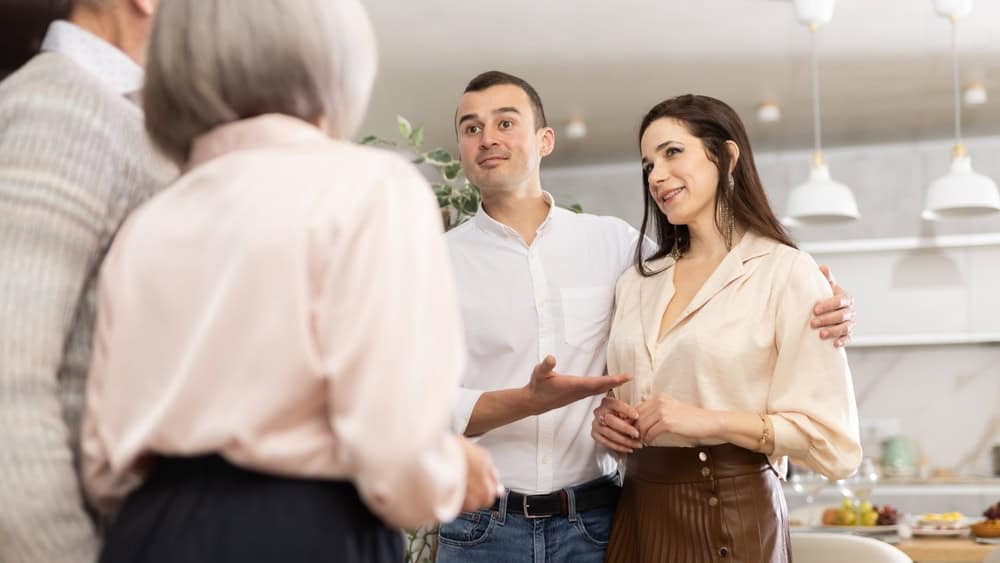 Middle-aged son introduces his girlfriend to elderly parents. Upset parents look disapprovingly at their son and his chosen one.