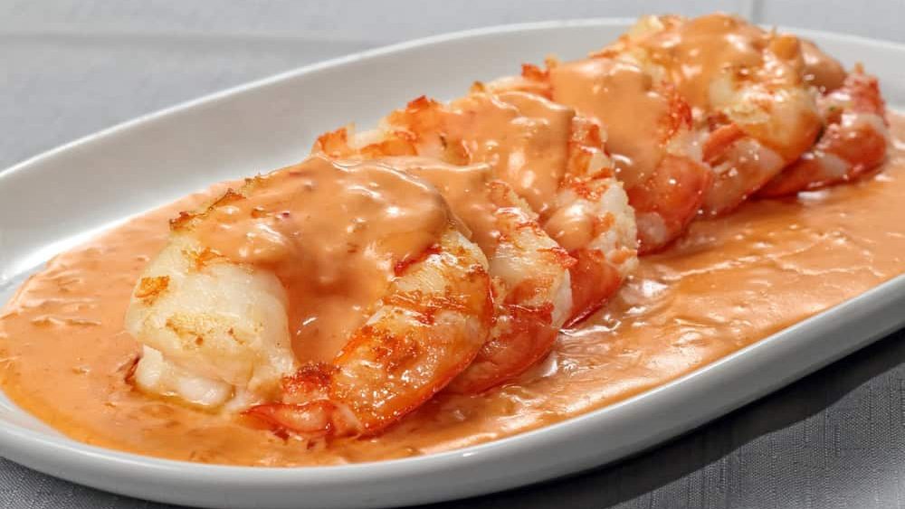 Shrimp Newburg with white rice on a plate