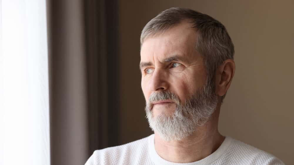 Portrait of lonely mature man at home