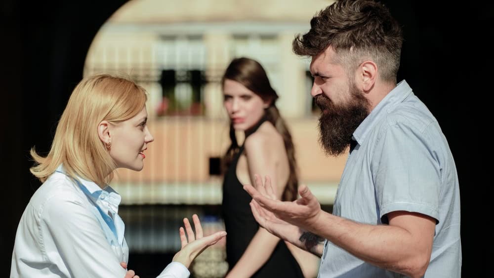 Cheating. Emotional treason. Cheating couple. Man lied, cheated, and betrayed. Treason of the heart. Emotional treason. Feel cheating. Man cheating his wife or girlfriend. Love triangle and threesome.