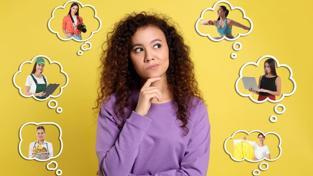 Young woman thinking about career options on yellow background. Thought bubbles with people of different occupations around her. Choice of profession