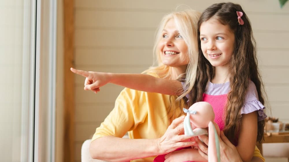 Mother holding child close, sharing a moment of connection and conversation in a cozy kitchen environment, emphasizing family bonding and love