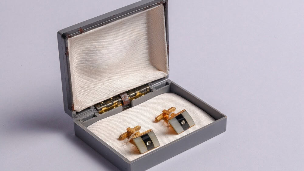 Vintage Gold Tone Cufflinks Displayed in an Open Jewelry Box on White Background