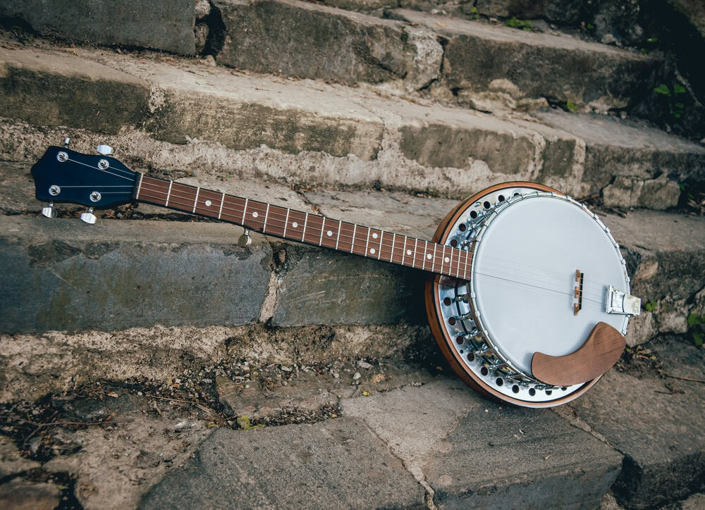 Silver metalic banjo on the stone stairs