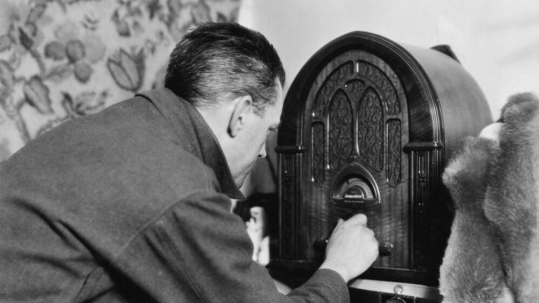 Man tuning the radio