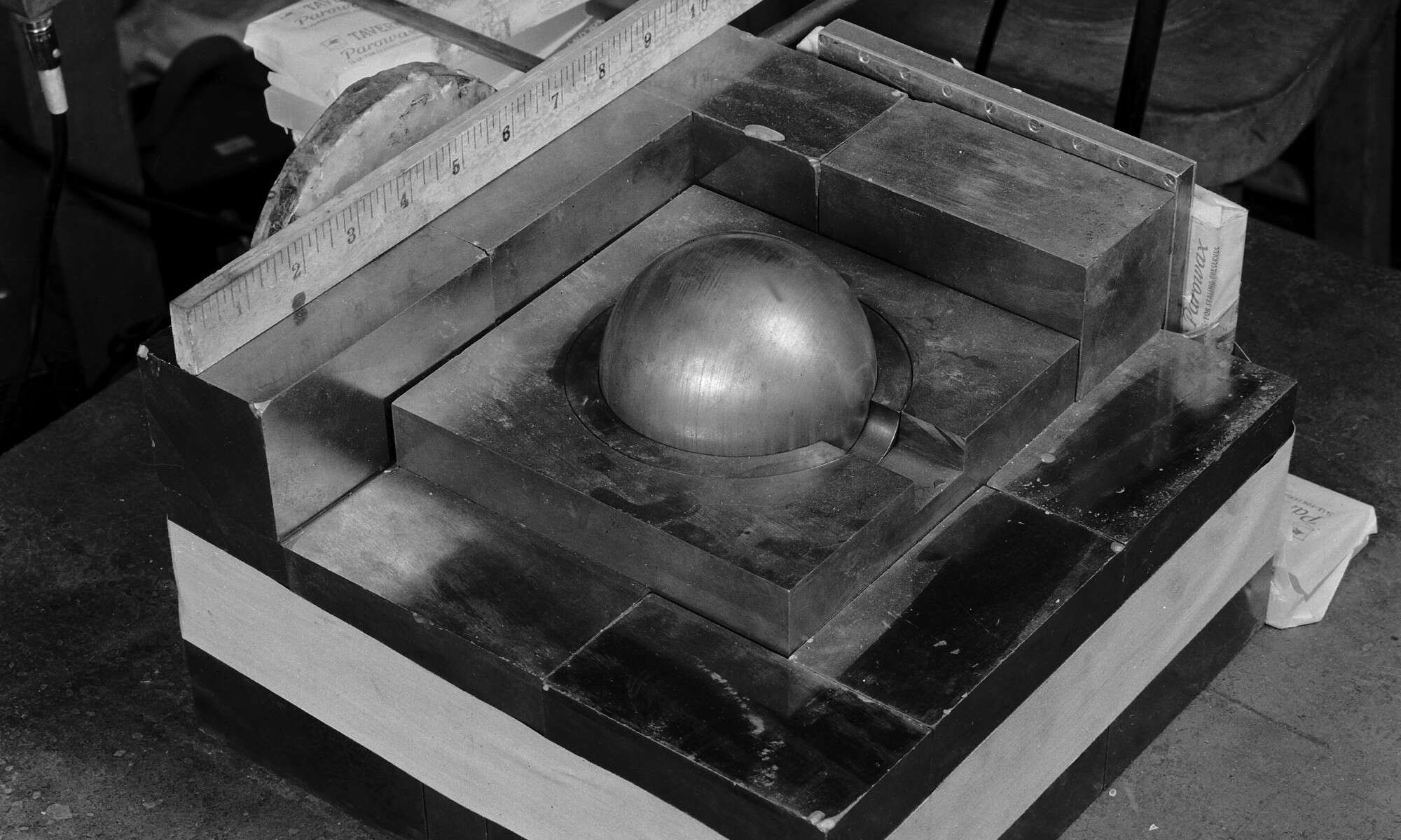 Partially reflected plutonium sphere