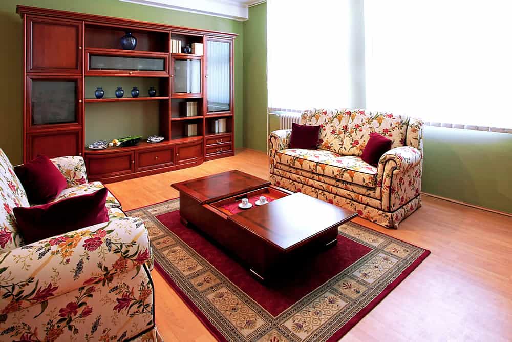 Interior of living room with floral furniture