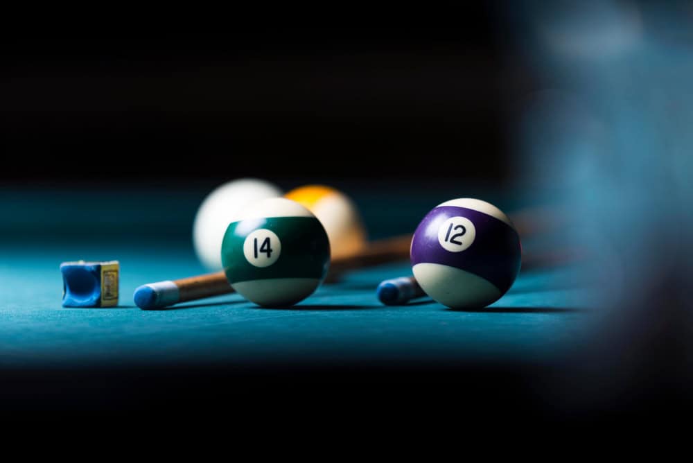 billiard table with cue and balls. billiards background
