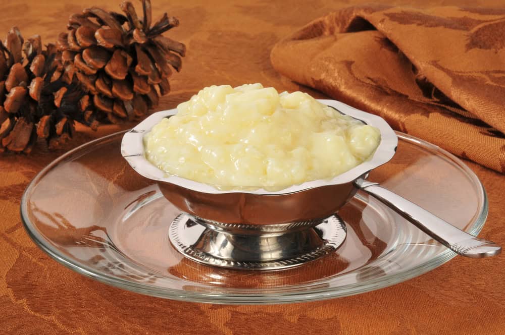 A silver dessert bowl of tapioca pudding