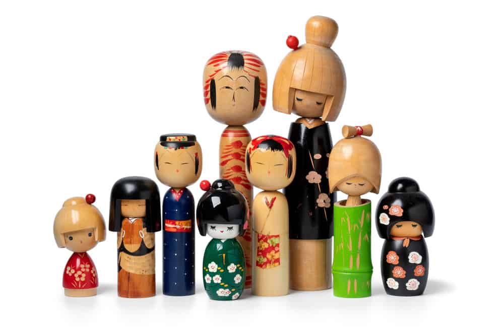 Collection of traditional wooden Japanese kokeshi dolls