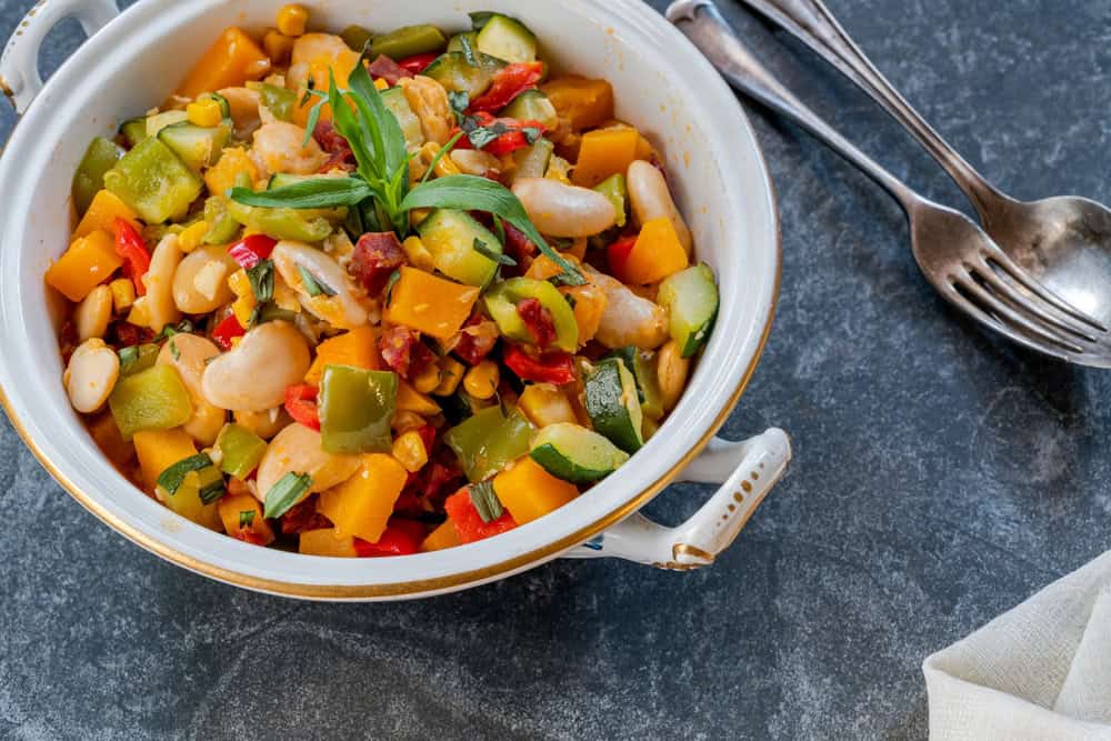 Succotash - Southern American dish with vegetables, butter beans, butternut squash, sweetcorn and chorizo