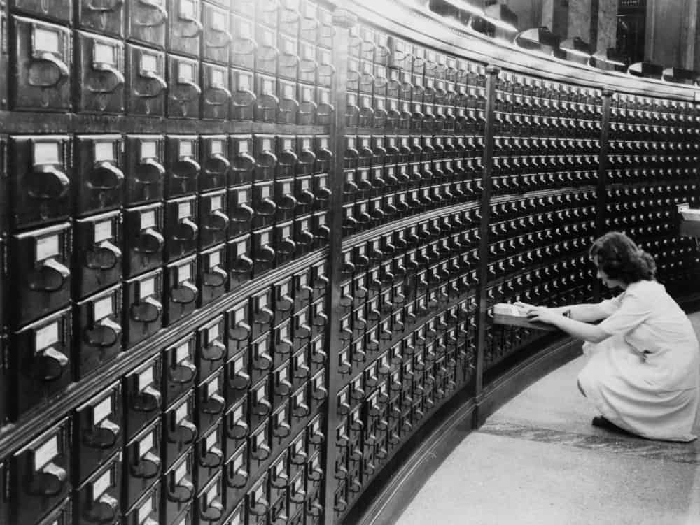 Woman using the card catalog at the Main Reading Room of the Library of Congress, ca. 1940.